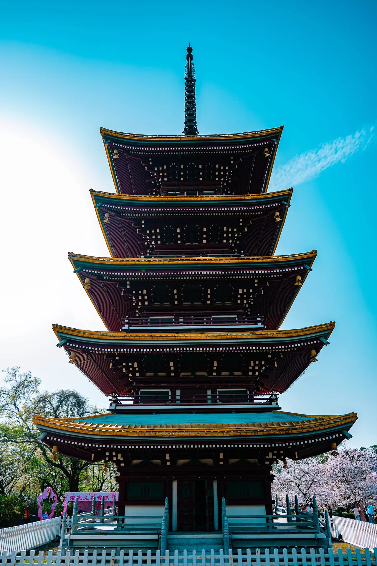 Five-storey pagoda against a bright blue sky